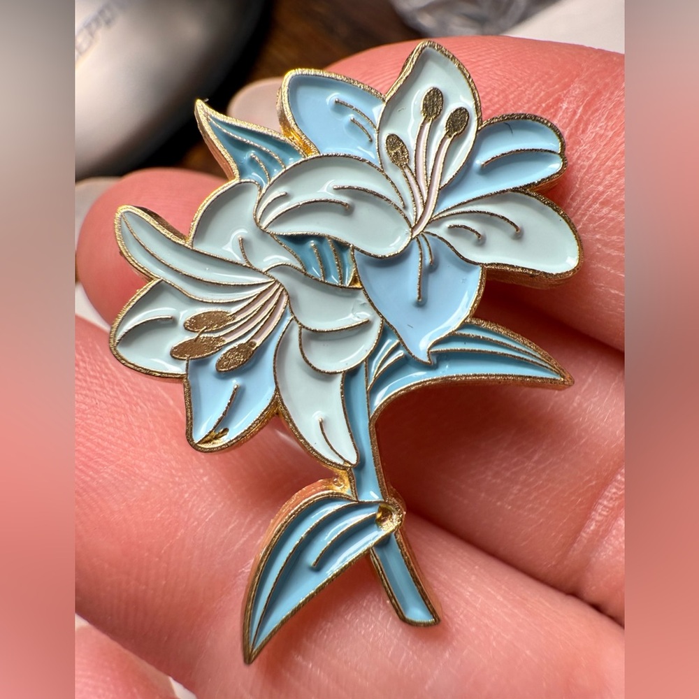 Elegant Blue and White Floral Brooch